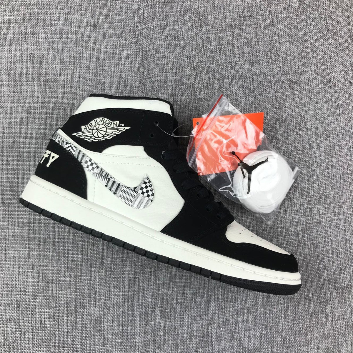 Air Jordan 1 Mid Black History Month Sneakers 852542-010
