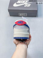 Nike SB Dunk Low Bearbrick-Inspired Cream and Blue Sneakers