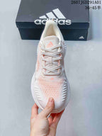 adidas AlphaBounce Beyond Running Sneakers in White and Pink