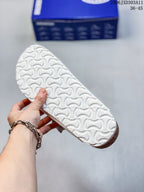 Birkenstock Two-Strap Slide Sandals in White