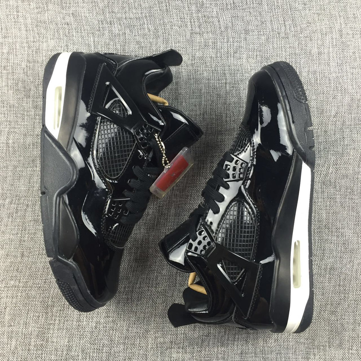 Jordan Air Jordan 4 Black Glossy Sneakers