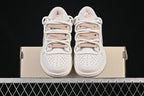 Nike SB Dunk Low Sneakers in White and Soft Pink
