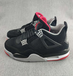 Jordan 4 Retro Sneaker in Black, Red and White