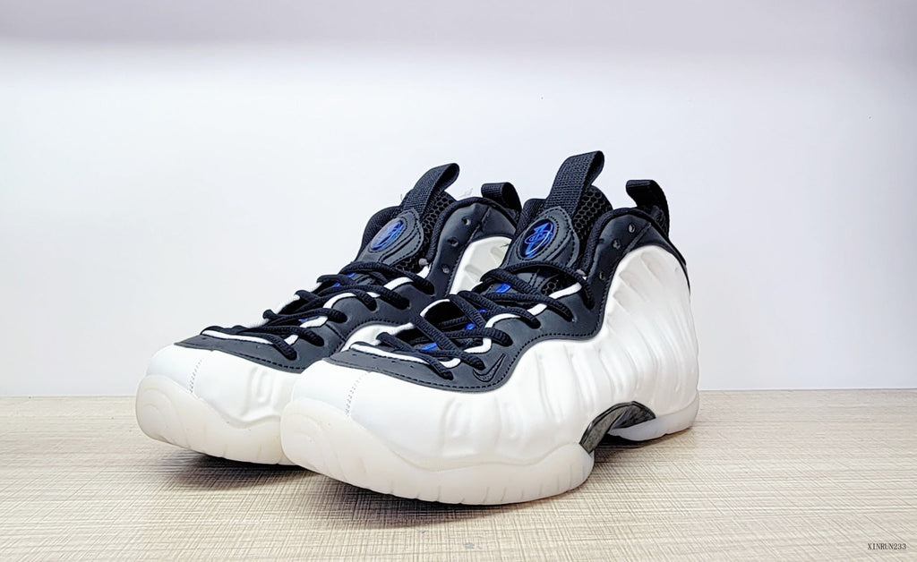 Nike Air Foamposite One High-Top Sneakers in Black, White and Blue
