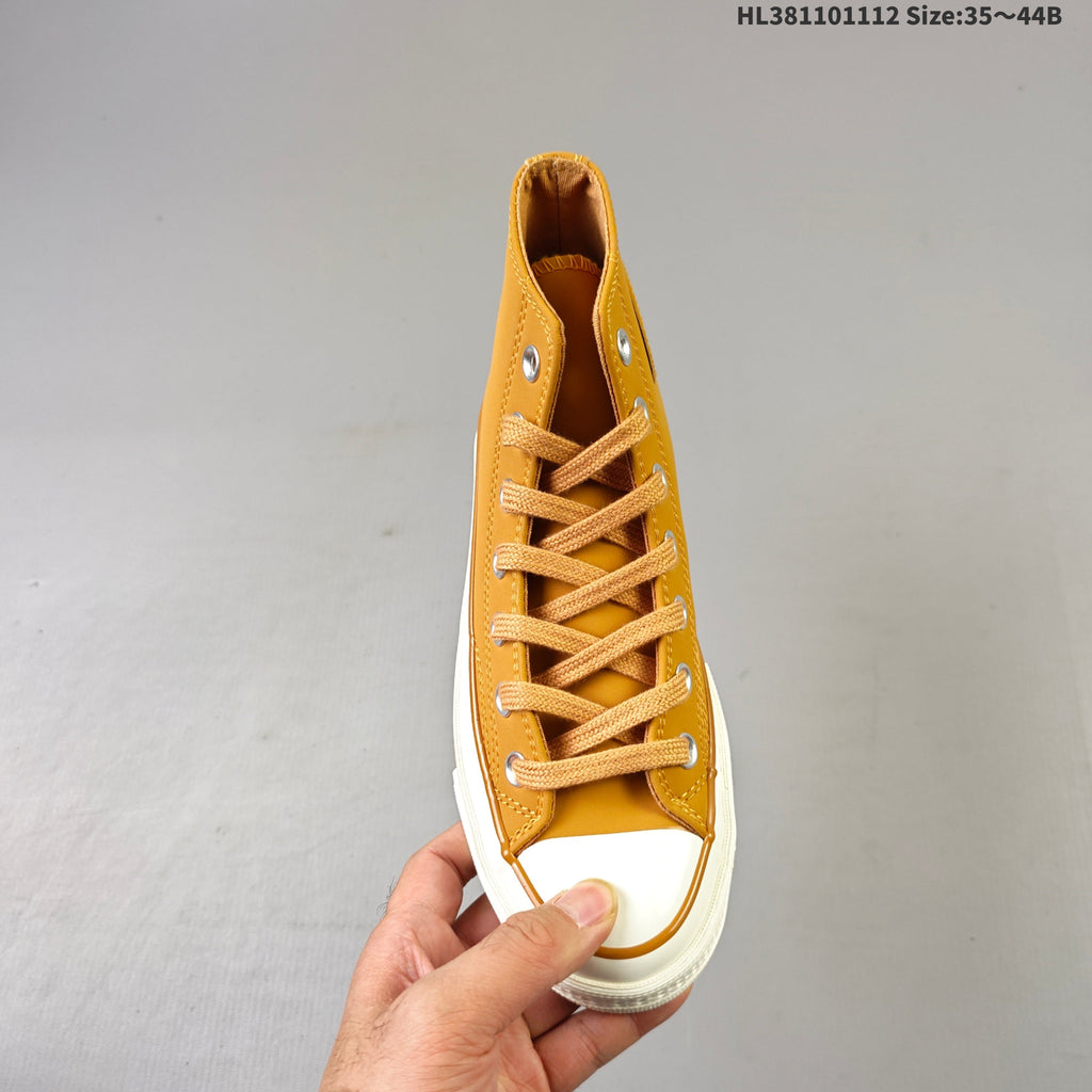 Converse Chuck 70 High Top Sneakers in Mustard