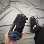 Air Jordan 11 Cap and Gown Black High-Top Sneakers
