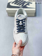 Nike Dunk Low White Sneakers with Navy Laces