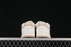 Nike SB Dunk Low Sneakers in White and Soft Pink