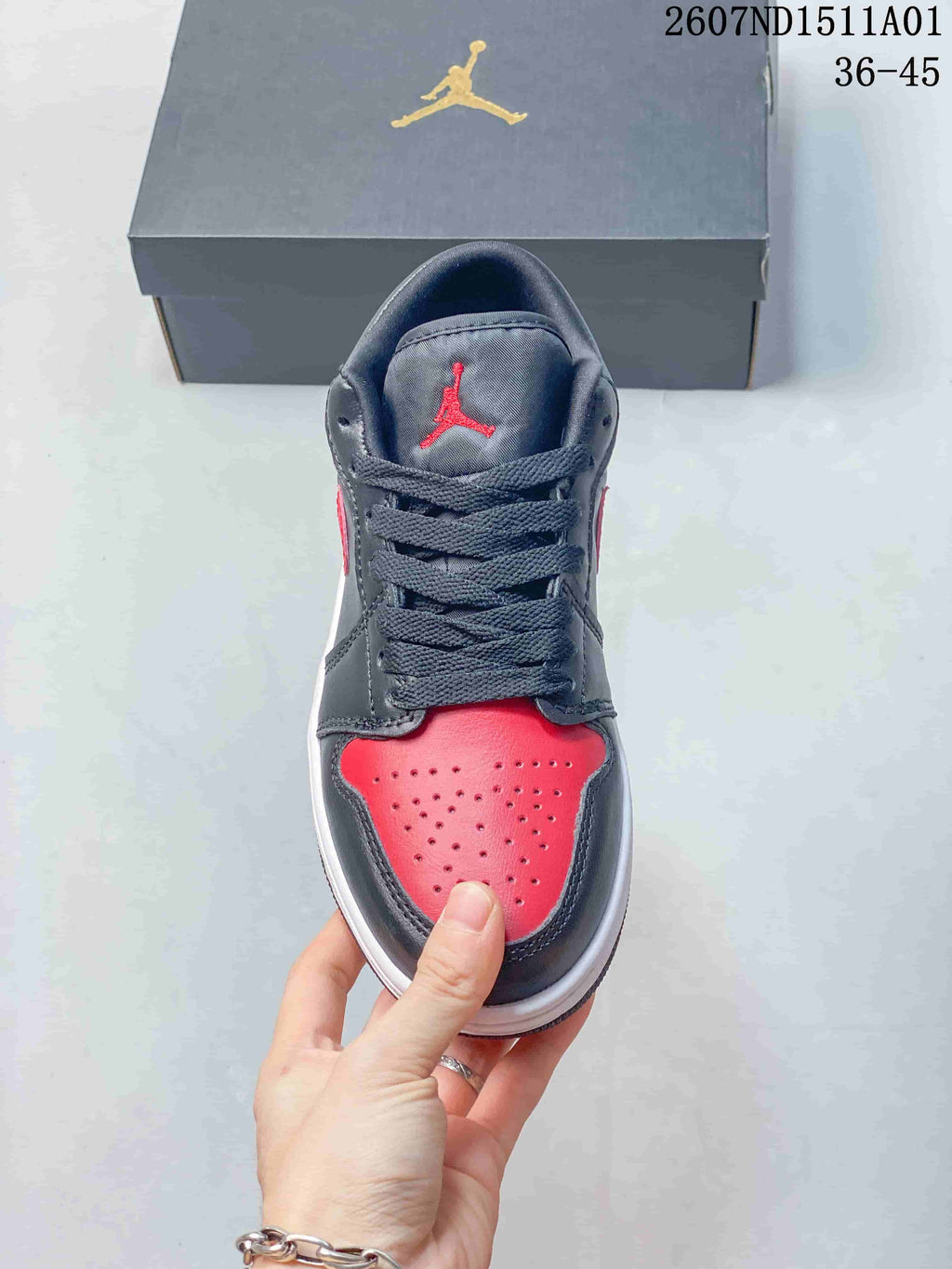 Jordan Air Jordan 1 Low Bred Black and Red Sneakers