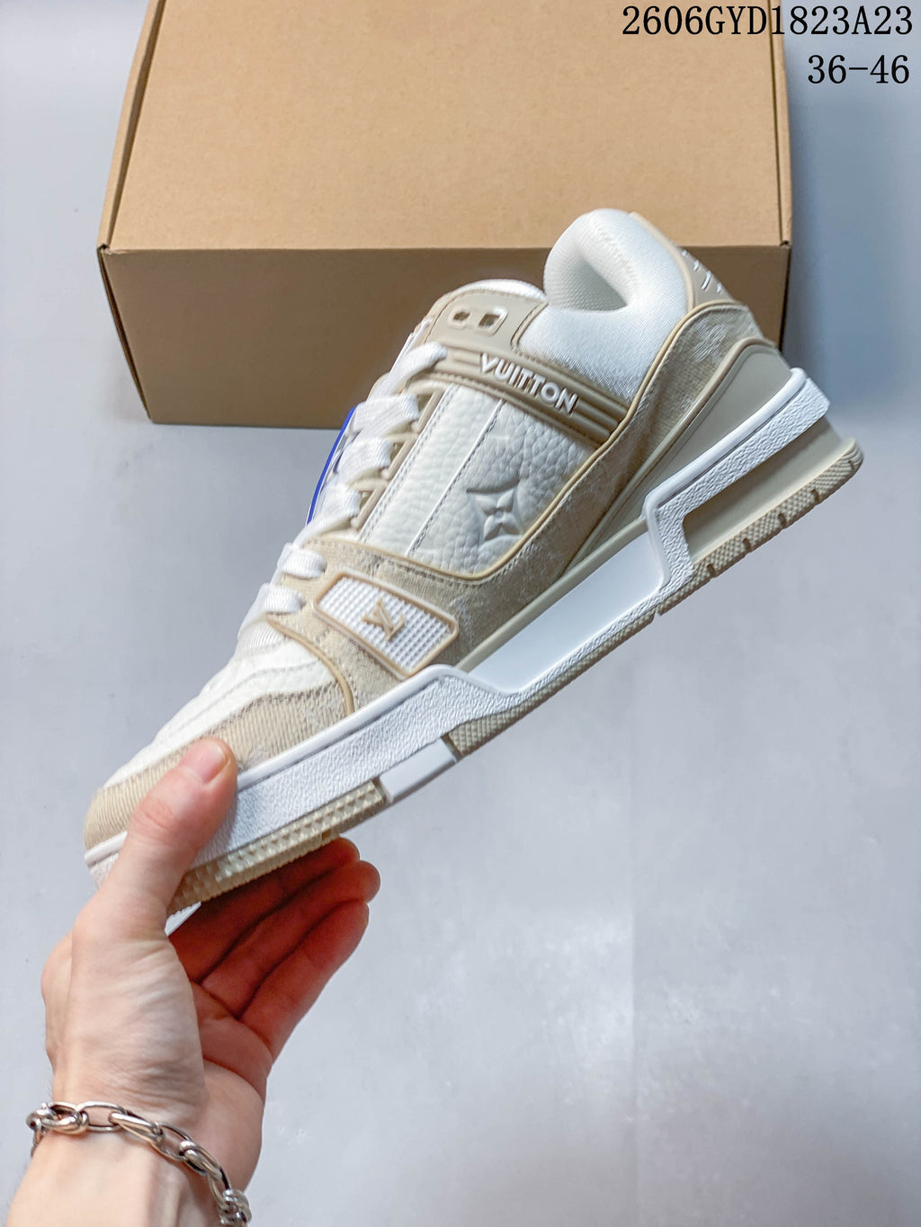 Louis Vuitton Trainer Low-Top Sneakers in White and Beige