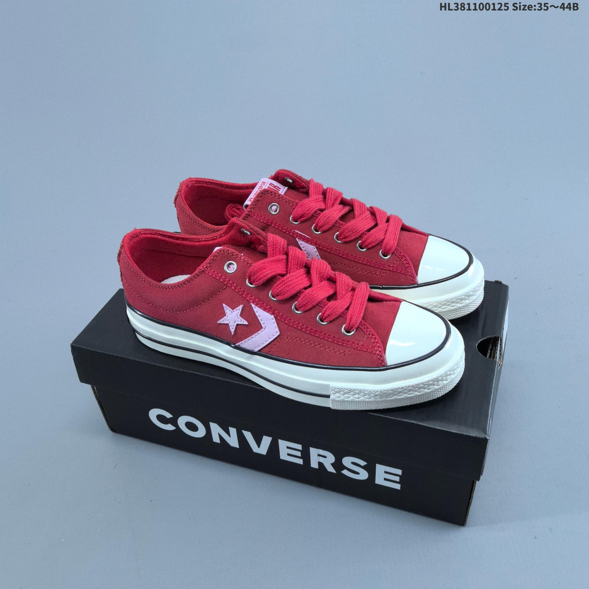Converse Star Player Ox Low-Top Sneakers in Navy/White