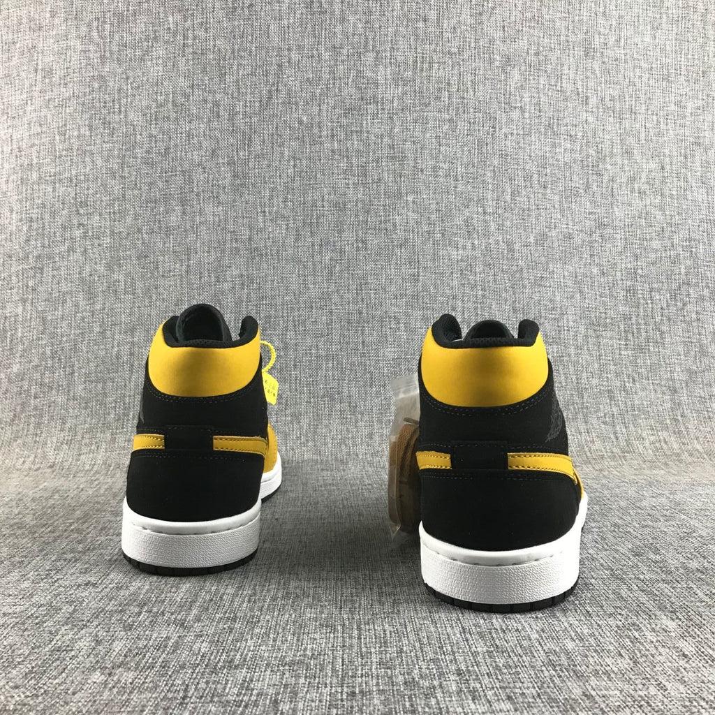 Air Jordan 1 Mid Black and Yellow Sneakers
