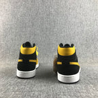 Air Jordan 1 Mid Black and Yellow Sneakers