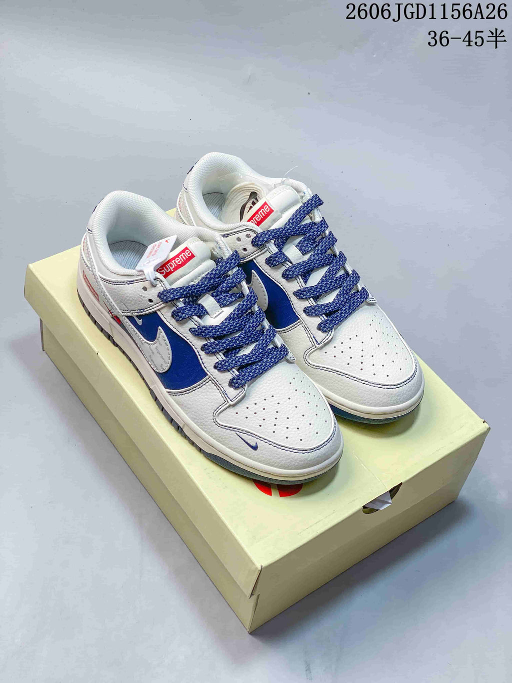 Nike Dunk Low Sneakers in White and Blue Monogram Style