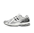 New Balance M1906RER Sneakers in White and Black