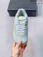 Nike Air Max 90 Sneakers in Pale Blue and Mint