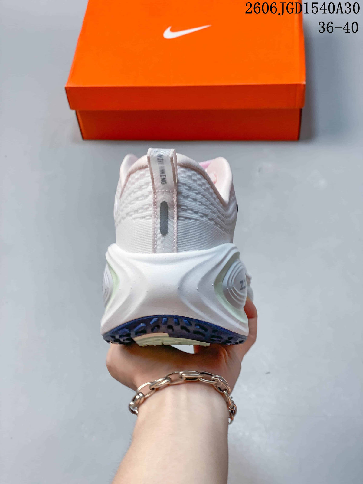 Nike Vomero Plus Running Shoes in White and Pink