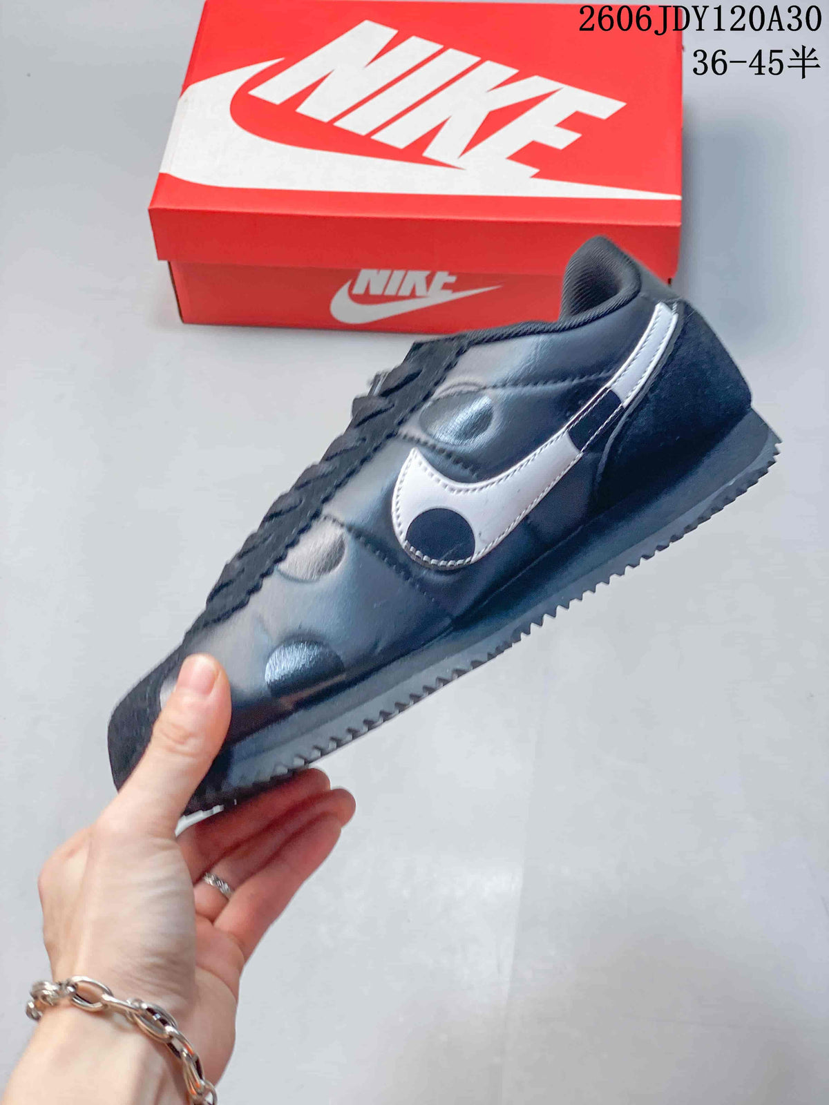 Nike Classic Cortez Sneakers in Black and Silver