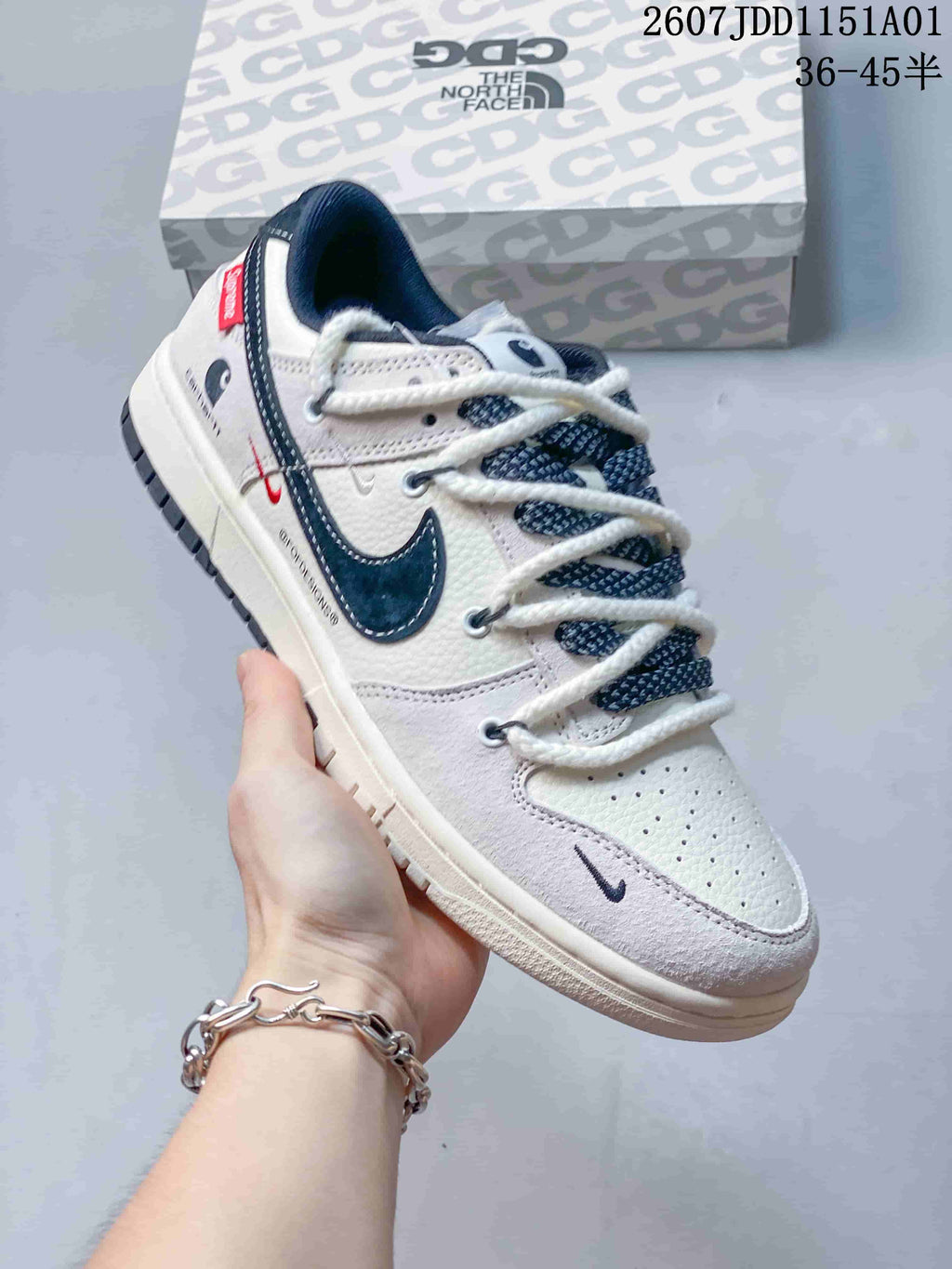 Nike SB Dunk Low x Carhartt White and Navy Sneakers