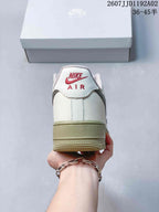 Nike Air Force 1 ’07 Low Sneakers in White and Olive
