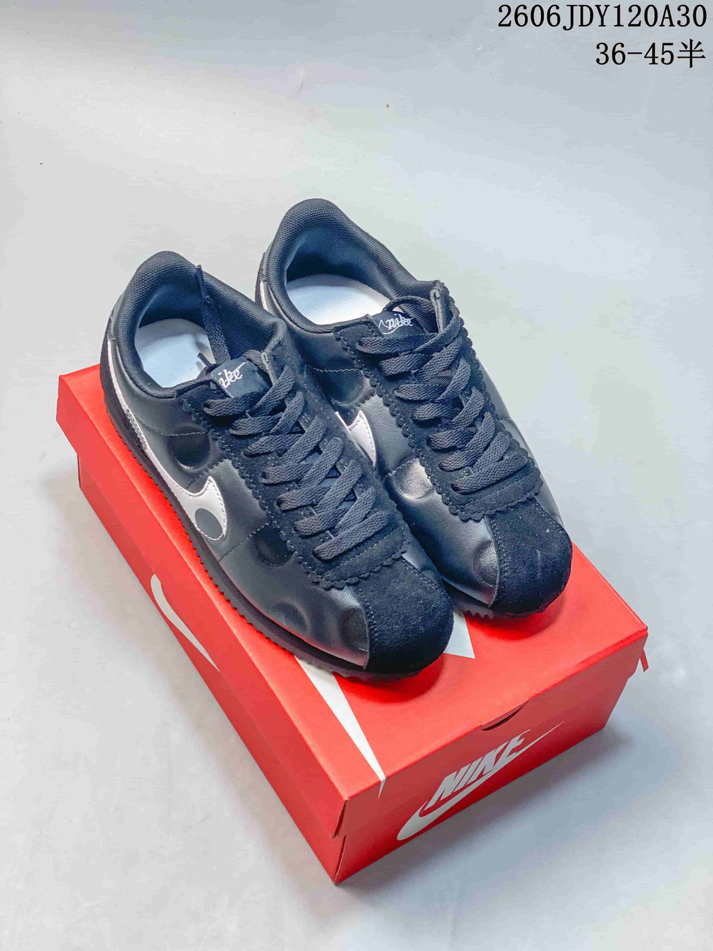 Nike Classic Cortez Sneakers in Black and Silver