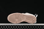 Nike SB Dunk Low Sneakers in White and Soft Pink