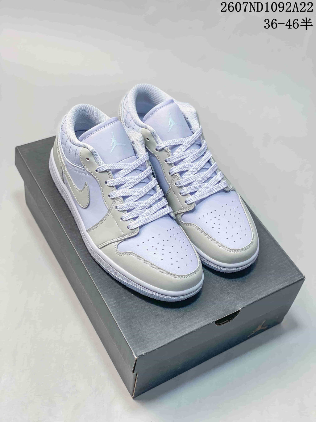 Jordan Air Jordan 1 Low Sneakers in White and Lavender