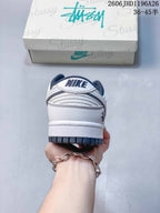 Nike SB Dunk Low White and Navy Sneakers