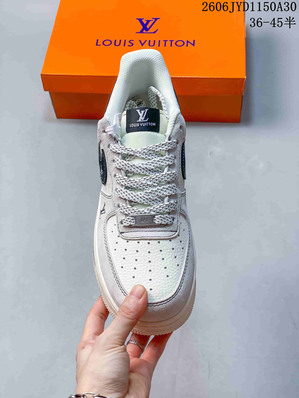 Low-Top Sneakers in White and Black with Monogram Details