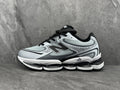 New Balance Silver and Black Sneakers