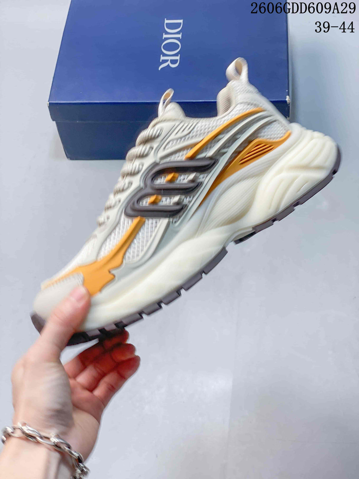 Dior Technical-Style Sneakers in Cream and Orange 2606GDD609A29