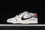 Nike SB Dunk Low Collaboration Sneakers, White and Black