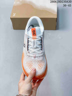 On Cloudtilt Sneakers in White and Orange