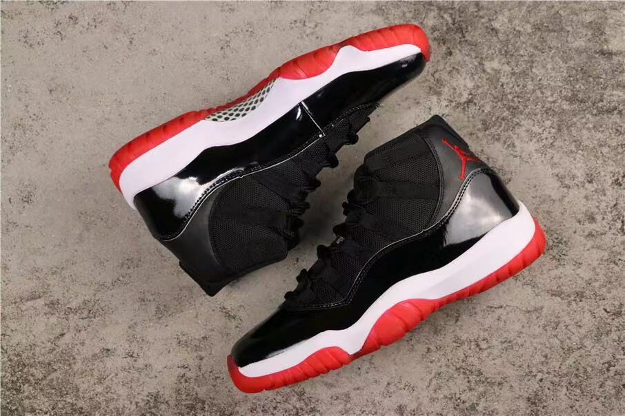 Air Jordan 11 Retro Bred Black and Red High-Top Sneakers