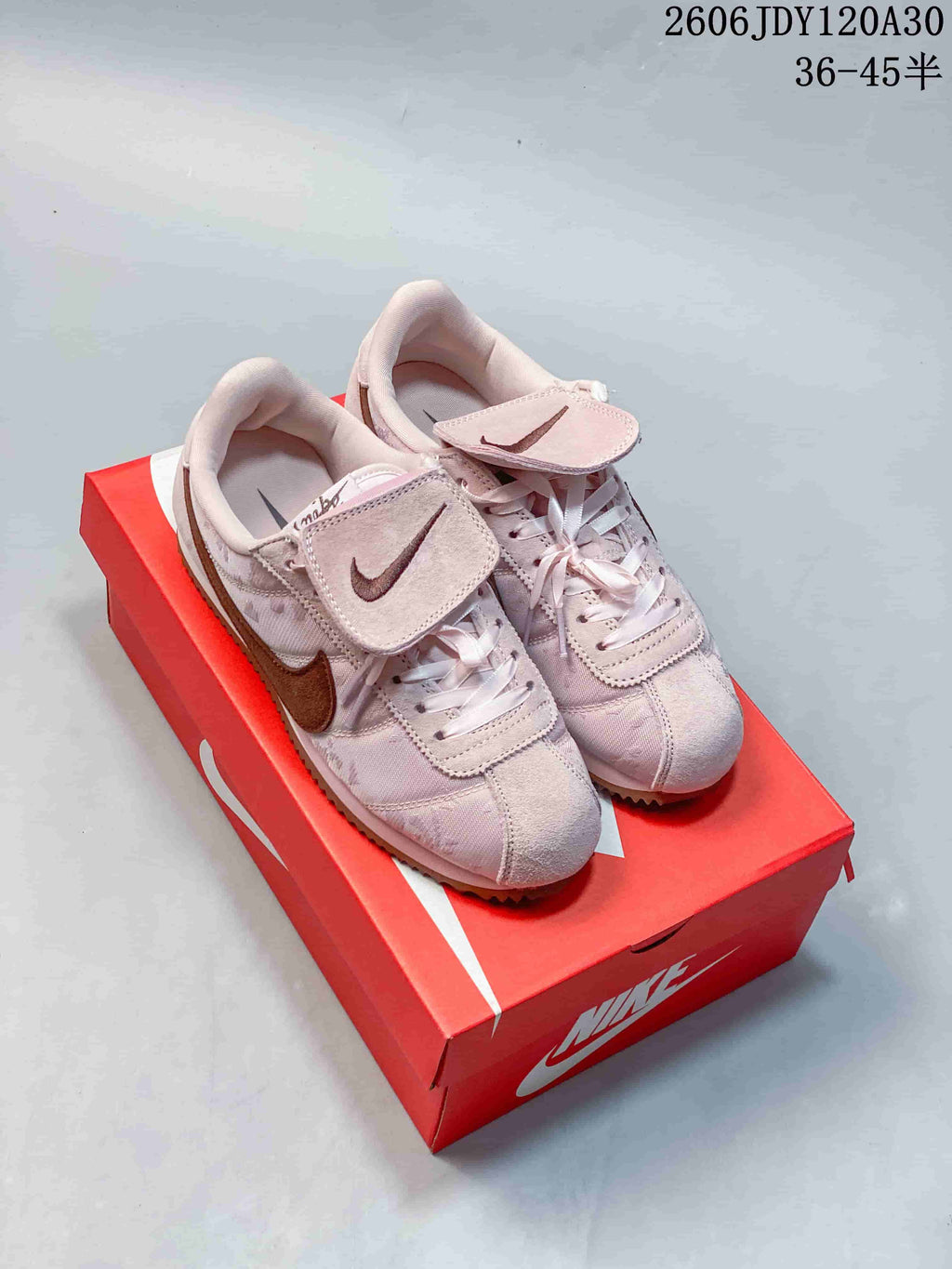 Nike Classic Cortez Low-Top Sneakers in Black or Pink
