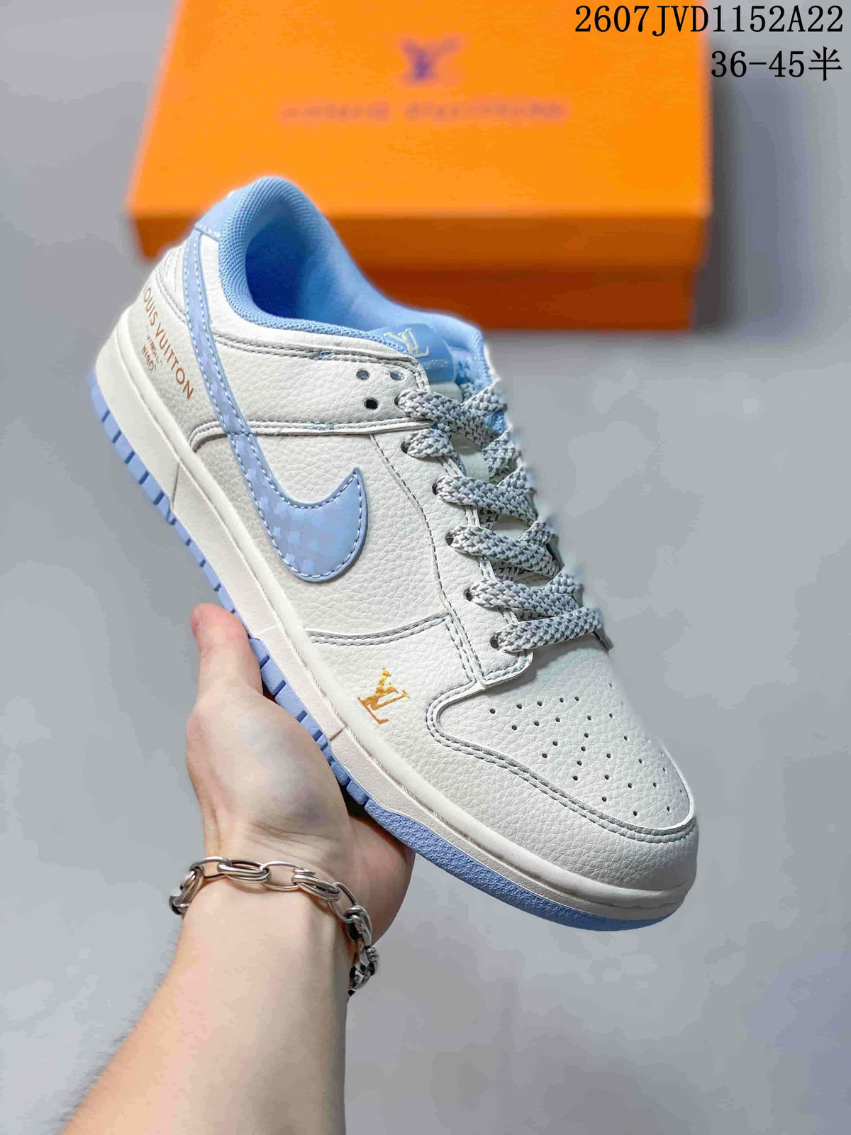 Nike Dunk Low Retro x IP Sneakers White and Light Blue