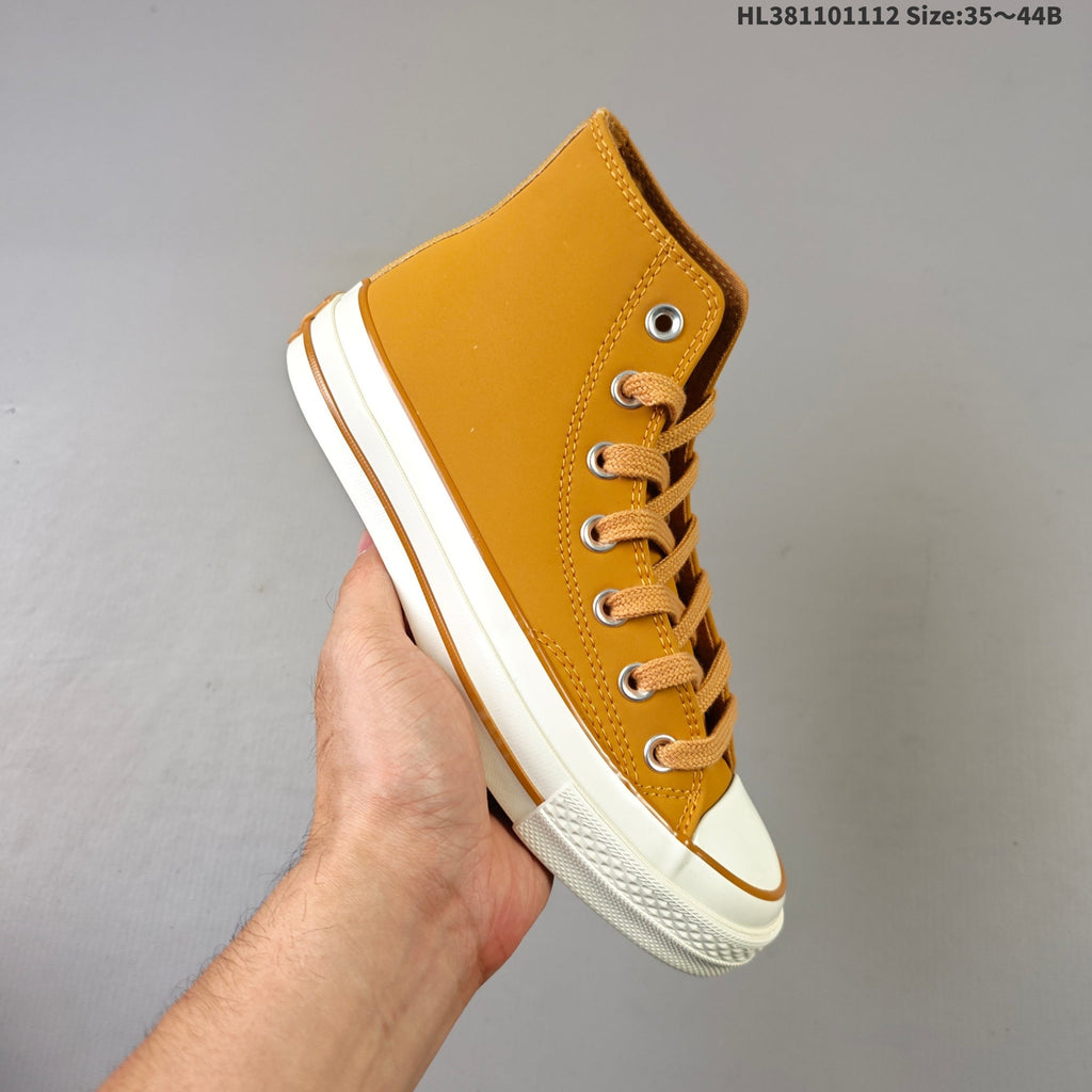 Converse Chuck 70 High Top Sneakers in Mustard