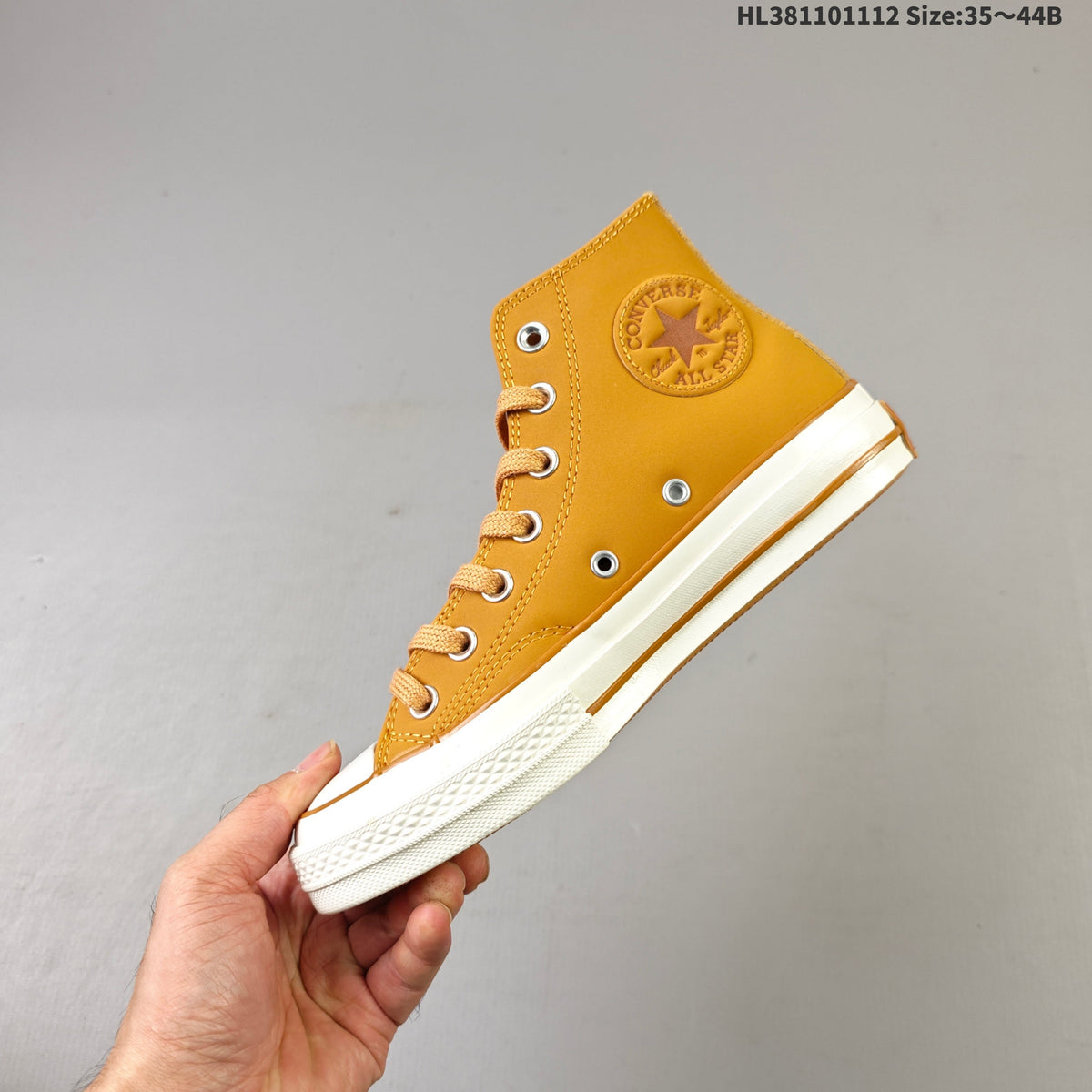 Converse Chuck 70 High Top Sneakers in Mustard