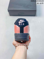 Nike Air Force 1 ’07 Low Sneakers in Coral and Black