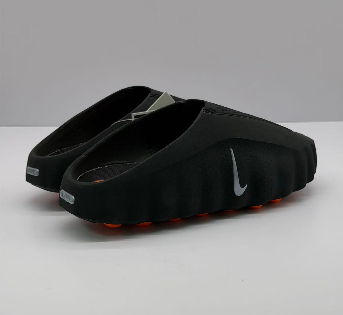 Nike Black Slides with Orange Pod Sole