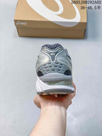ASICS GEL-KAYANO 14 Sneakers in Silver and Charcoal