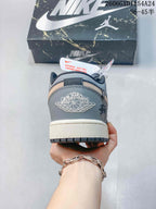 Jordan 1 Low Graffiti Sneakers in Gray and Cream