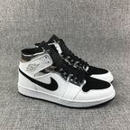 Air Jordan 1 Mid White and Black Sneakers