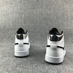 Air Jordan 1 Mid White and Black Sneakers