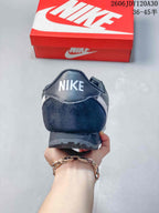 Nike Classic Cortez Sneakers in Black and Silver
