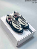 Chanel Black and White Low-Top Trainer