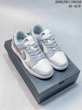 Nike SB Dunk Low Sneakers in White and Gray