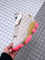 Air Jordan 13 CNY Sneakers in White, Gold and Pink