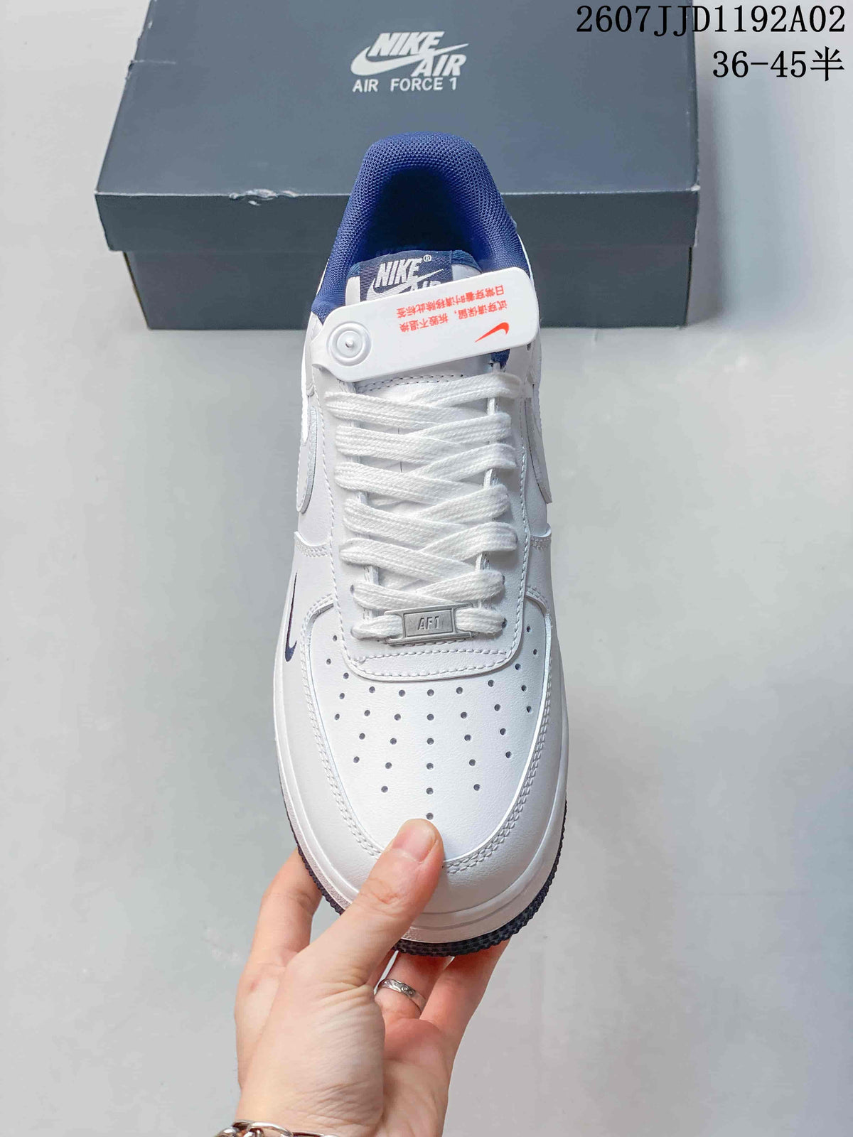Nike Air Force 1 ’07 Low White and Navy Sneakers
