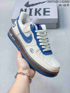 Nike Air Force 1 Low Monogram Sneakers in White and Grey